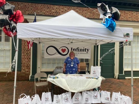 Dr. Baucom at the Smithfield Farmers Market, meeting the community