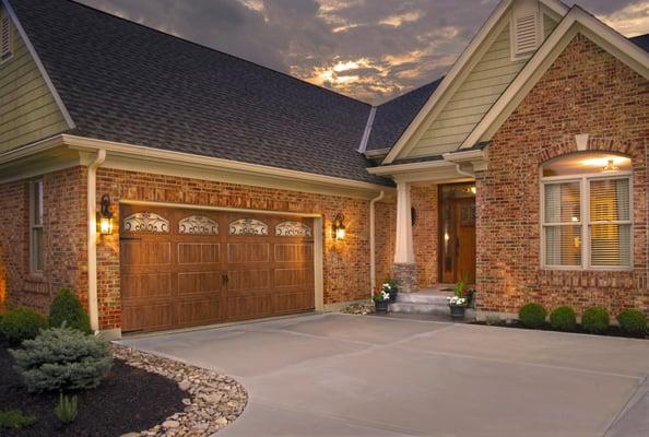 Gallery Collection steel garage door with ultra grain finish and decorative windows