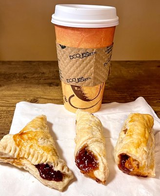 Jam filled pastry and cappuccino to go