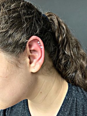 Curated cartilage piercing