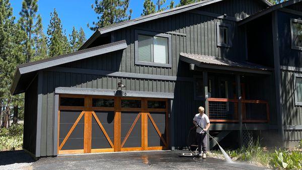 Muhlebach Way Remodel involved expanding the existing structure to accommodate a 2-car garage, updating the siding, fresh pain, and new roof