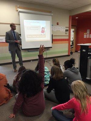 Trent volunteering to help educate students in Leander ISD on Money Matters