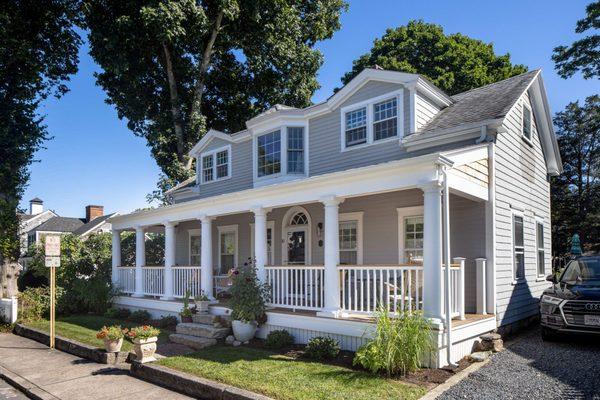 New front porch with columns and mahogany ceiling and decking