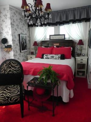 THE BOUDOIR--Located on second floor--Queen size bed, private bath, and balcony, TV/VHS/DVD, WI-FI. This room has attitude!