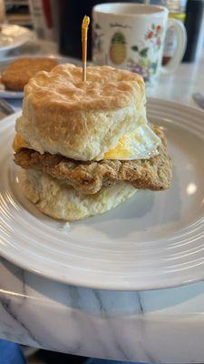 Chicken fried steak with egg and cheese. The biscuit was delicious-light and tasty.