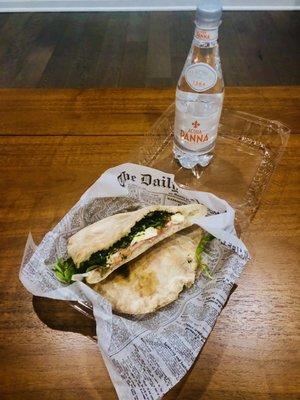 Prosciutto and arugula sandwich with Italian water