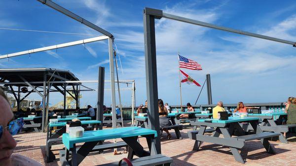 Outdoor bar area looking north with the lifeguard shack in the back.