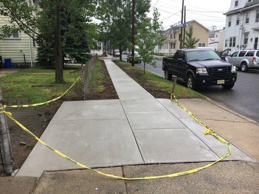 Concrete driveway and sidewalk.