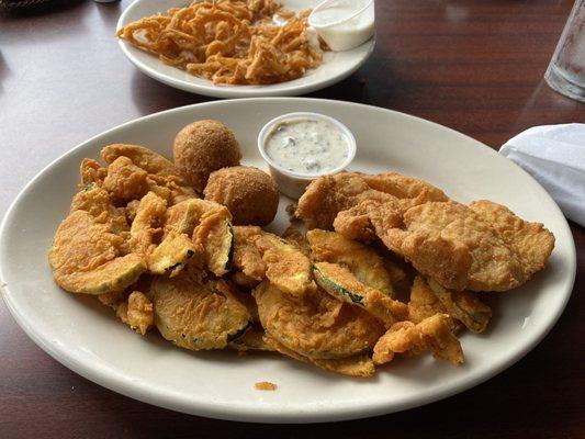 Fried flounder, fried zucchini, and hush puppies