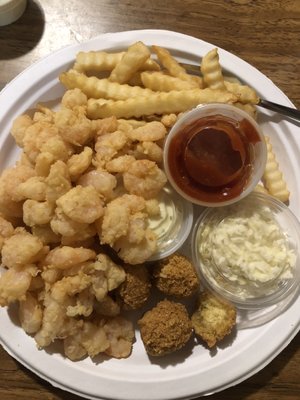 Gluten free popcorn shrimp, gluten free hush puppies, French fries, white slaw, tarter sauce, shrimp sauce, sweet tea! All delicious!