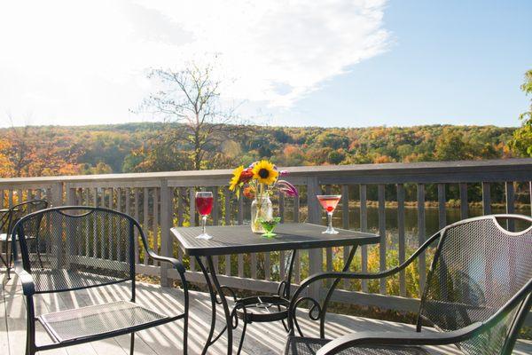 Enjoy a cocktail on the deck while taking in spectacular views of the Farmington River!