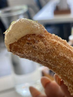 Churro and white dipping sauce