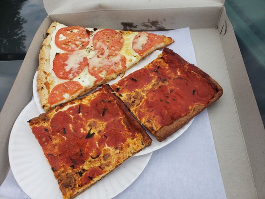 2 whole wheat grandma slices and a white slice with tomato