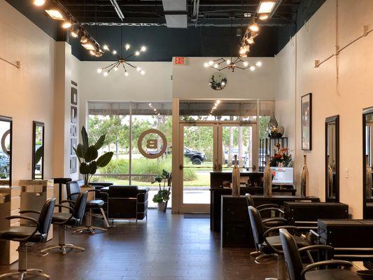 Modern boutique salon with a cool industrial glam style.