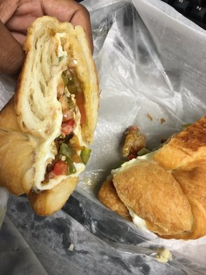 Egg white, peppers, tomatoes, jalapeños, and pepper jack cheese on a croissant. Yummy!!!