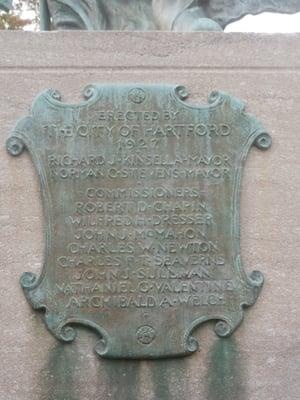 Plaque on rear of base