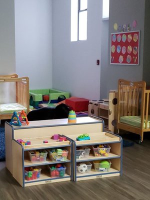 The Infant room has places to play and lots to play with.