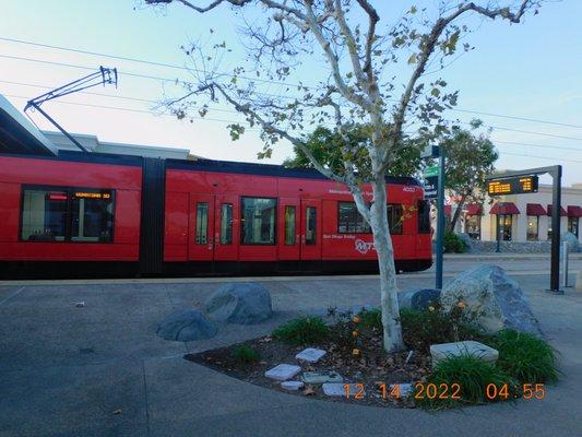 Santee town center has a great old west design of the tracks outside just like waiting at an old train station. With the many tress.