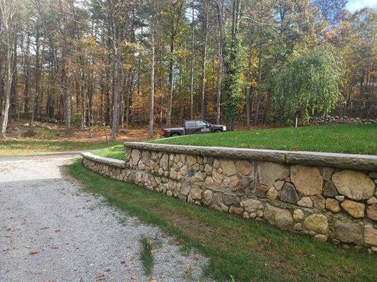 New England Fieldstone retaining wall.