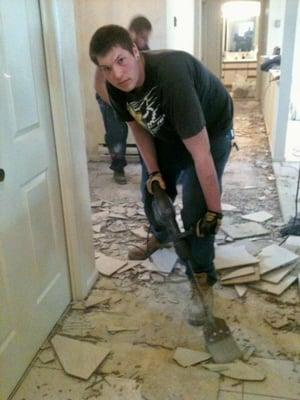 Ripping old ceramic tile to replace with new wood flooring. Will add new picture when floor is installed.