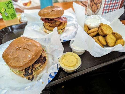 Left to right: Grilled Chicken Sandwich, Onion Ringster with Turkey Bacon, Fried Pickles