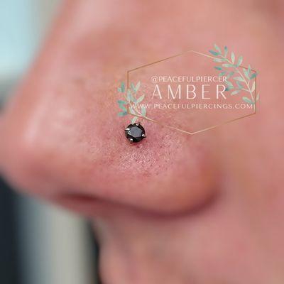 Internally threaded 3mm prong set Jet stone in fresh nostril