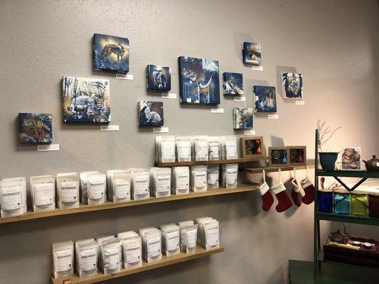 Little woods showcases local art on their walls. Also amazing stocking stuffer hand blended tea samplers.