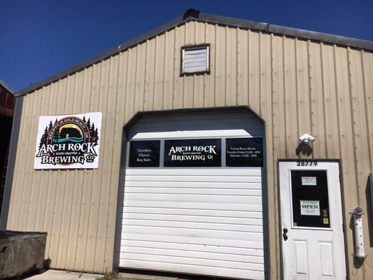 The tasting room is the door on the right with 4 seats inside.