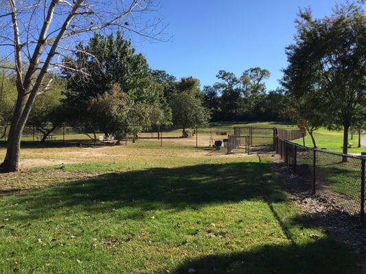 Large fenced in area for small dogs adjacent to the larger dog fenced in area...