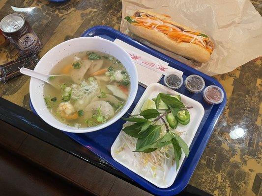 Seafood Phnom Penh Noodle Soup (Cambodian Pho) and BBQ pork bahn mi sandwich