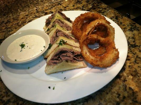 Shaved roast beef and havarti grilled cheese sandwich with horseradish dipping sauce and onion rings. #wagongrill