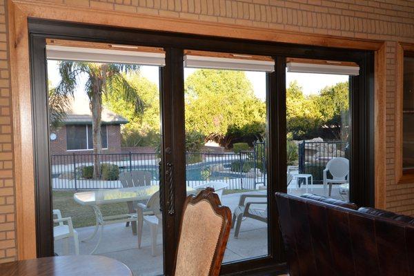 Set of three folding doors.  This room opens up to the outdoors.  It's great when the temperatures are comfortable.