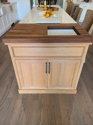 Island with butcher block top.