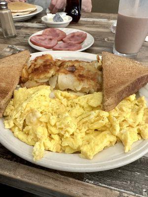 Weekday Breakfast special - eggs, meat, homefries, toast.