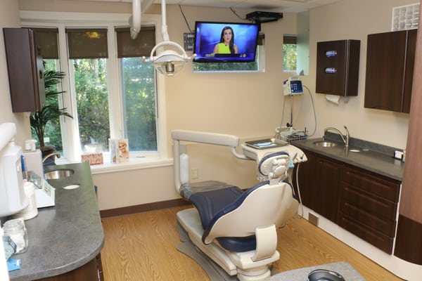 One our treatment rooms. Gaze out the bay window or watch TV with over 200 cable channels and your own remote control.