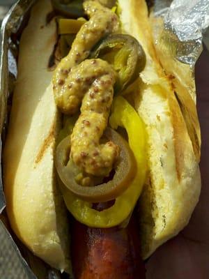 Polish dog with grilled onions, banana peppers, jalapeno peppers, & spicy mustard, yummm :-)