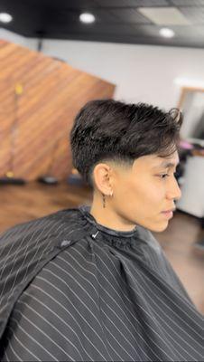 Low Fade styled w Curtain Bangs