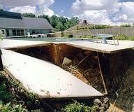 Erosion caused by leaking swimming  pool!