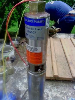 Working on a  well pump