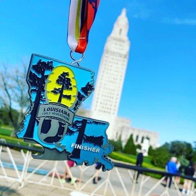 2020 Half Marathon Finisher medal - notice the bottle opener on the bottom left. Lots of people convert the medal to a fridge magnet! Love!