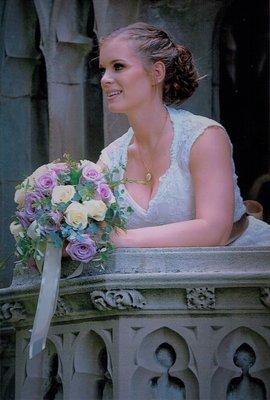 A beautiful bride and her Taylor's boquet