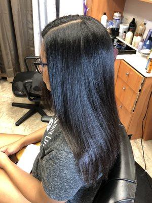 Flat ironed naturally curly hair after deep conditioning treatment.