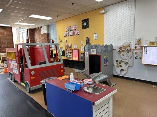 The fire safety station, next to the dentist office station where kiddos can pretend to be dentists.