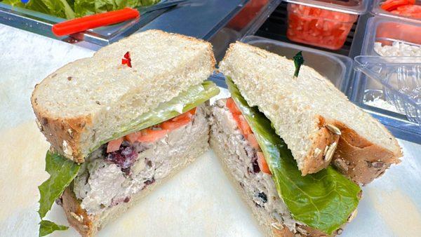 Chicken Salad Sandwich - Our fresh house made chicken salad with mayo and cranberries, lettuce, tomato and mayo served on multi grain