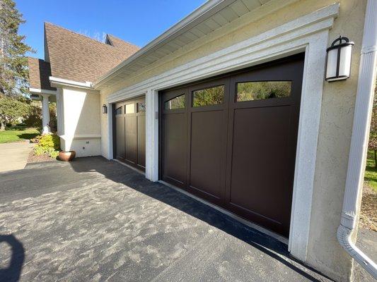 Custom CAMBEK Classics curve top wood garage doors with windows