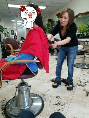 Finally getting a haircut after waiting under a hair dryer for 15 min