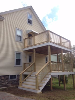 Pressure treated deck wrapped In pine