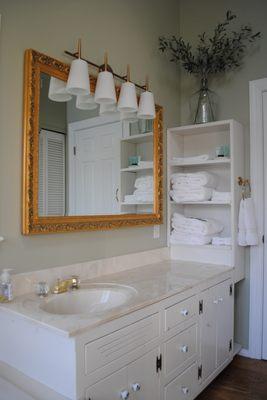 spacious bathroom (commode and shower behind door)