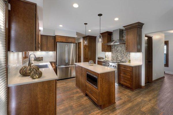 Natural warmth and serene white countertops, all using the best materials