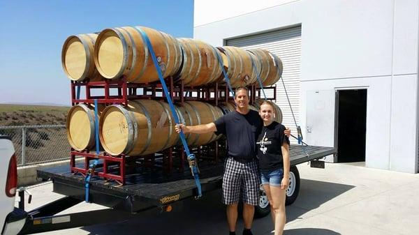 Owners of Vino Urbano, Olena and Harold, oversee the arrival of barrels